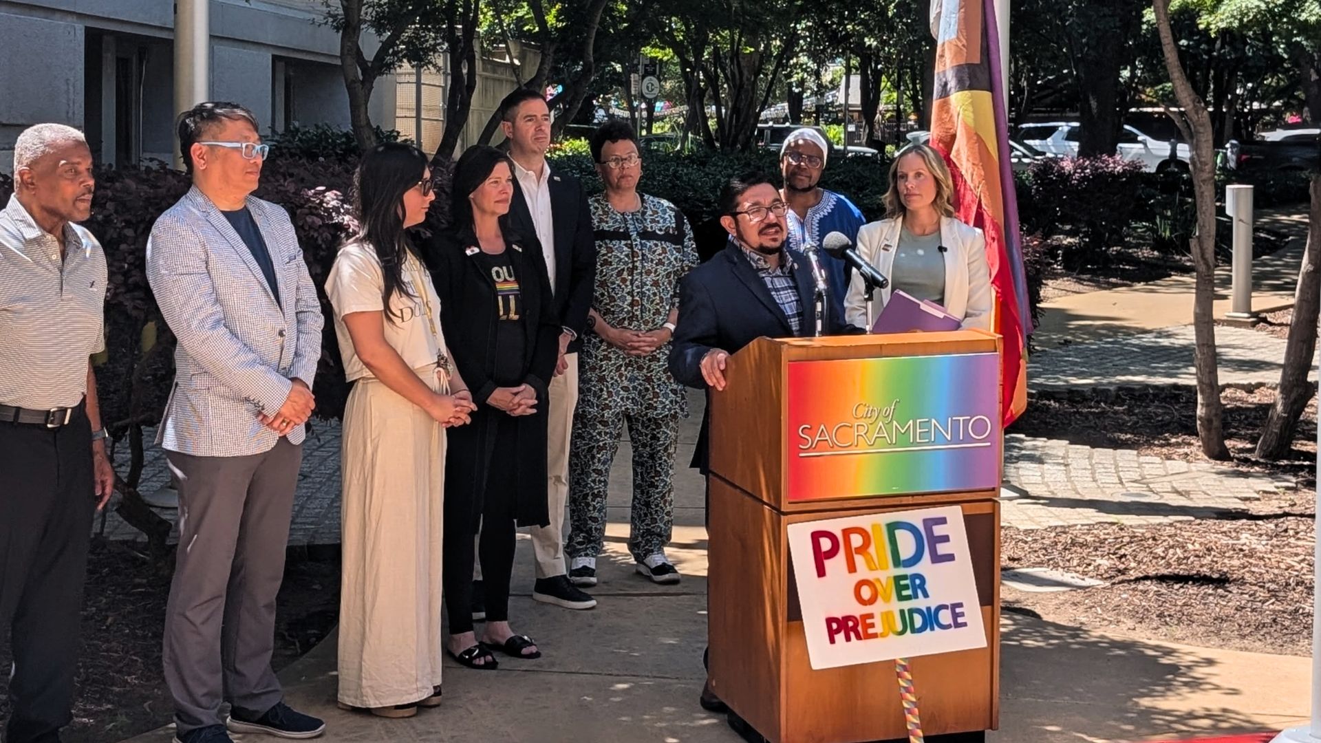 A Progress Pride Flag rose outside Sacramento City Hall on Monday morning, marking the city’s opening observance of Pride Month 2026 and continuing a civic tradition that began several years ago.