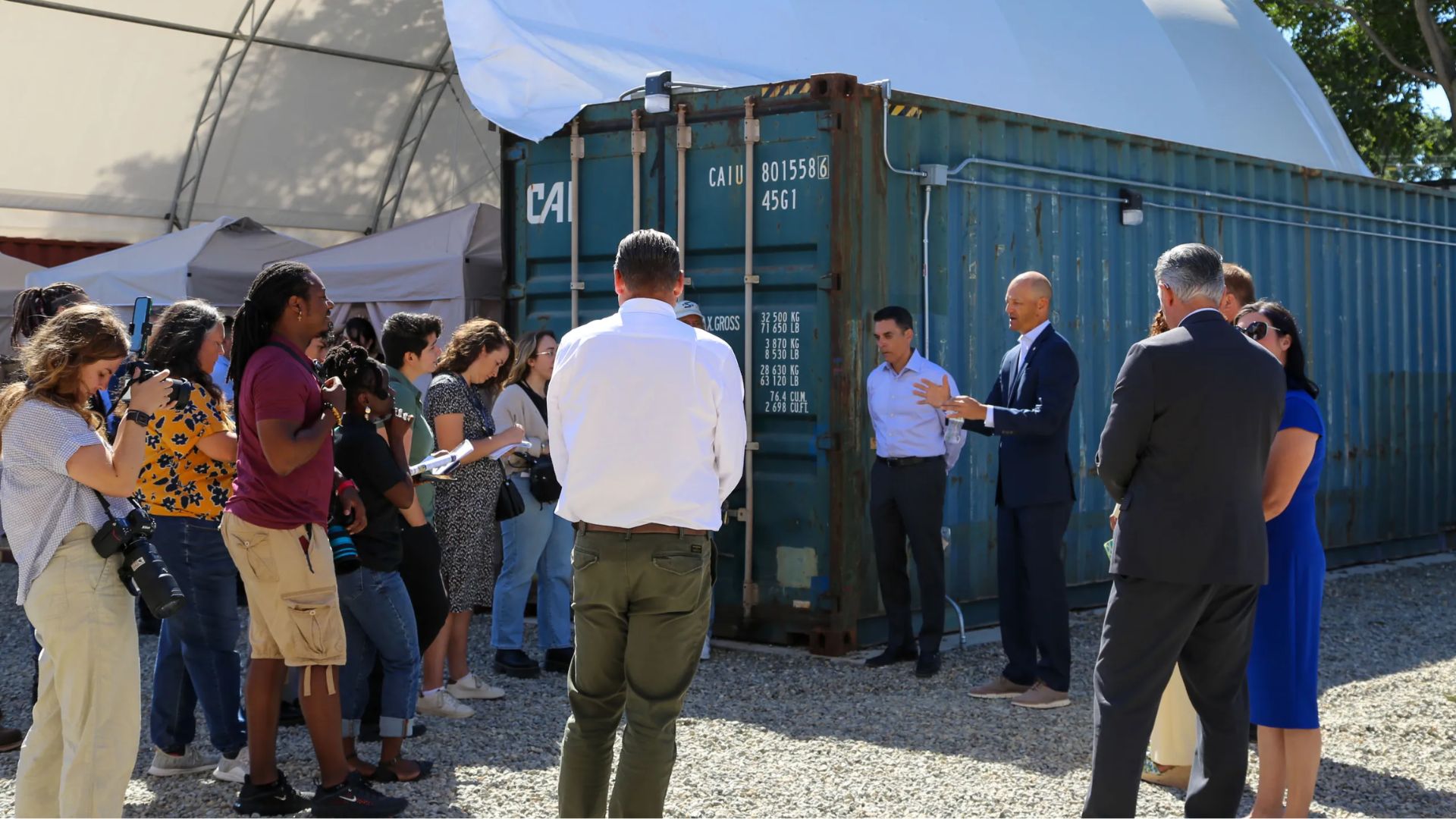 Sacramento’s newest answer to one of its hardest street-level problems is not a building. It is a gravel lot, rows of raised wooden platforms, shade canopies, tents, storage bins and a clear admission from City Hall: the path from a sidewalk encampment to permanent housing often begins somewhere far less perfect.