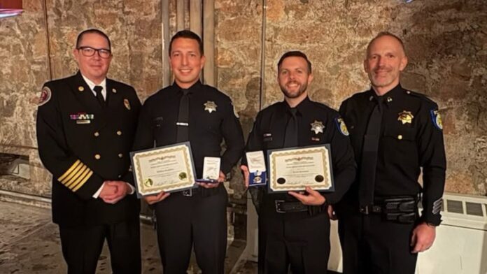 Officers Boughton and Moorman have been recognized for actions that turned a dangerous emergency into a story of teamwork, quick thinking, and survival.
